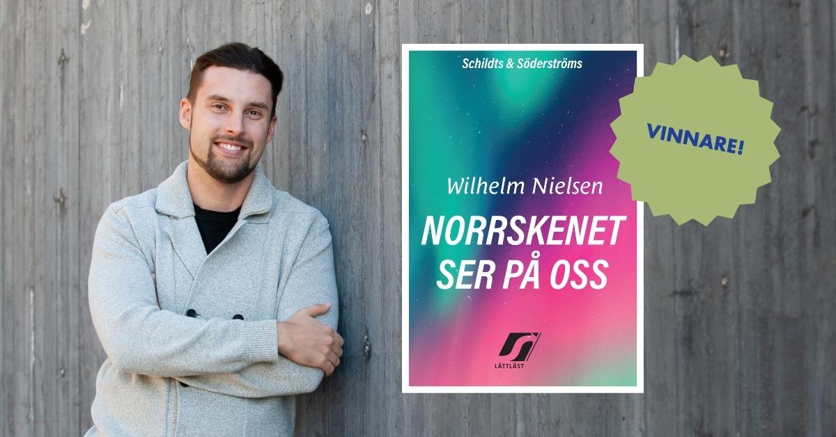 Wilhelm Nielsen och pärmen av Norrskenet ser på oss och texten Vinnare.